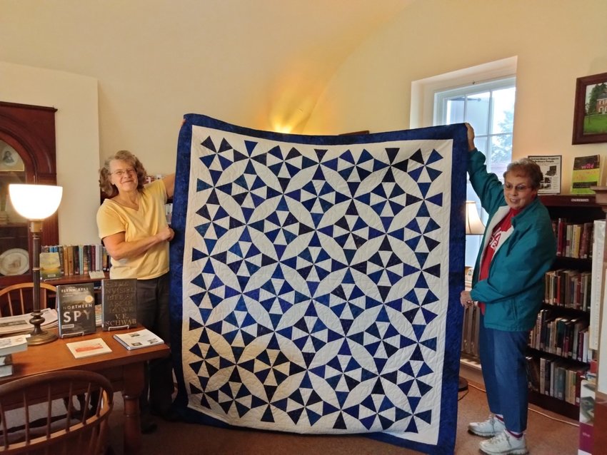 This quilt, made by Nancy Swingle of Bethany, is third prize in the Bethany Public Library's fundraising raffle.